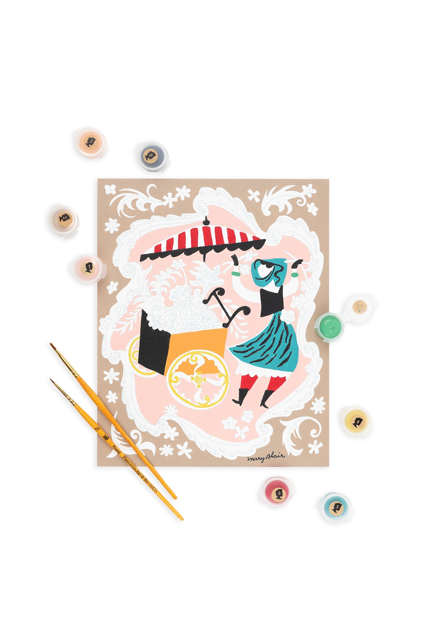Mary Blair’s Petal Peddler paint-by-number kit with flower cart scene, red striped umbrella, paint pots, and brushes on white background.