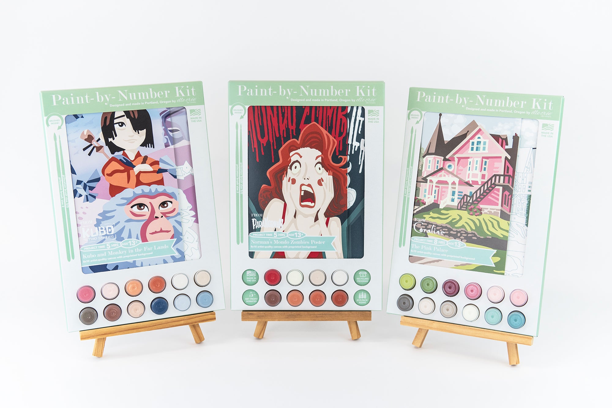 Three paint-by-number kits made by Elle Crée in collaboration with LAIKA Studios. From left: Kubo and the Two Strings, Mondo Zombies from Paranorman, and the Pink Palace Apartments from Coraline.