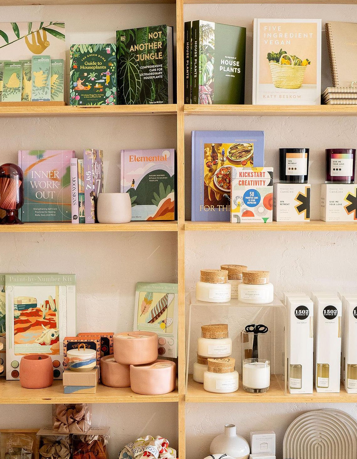 Paint-by-Number kits on a merchandising display at Small Batch Store.