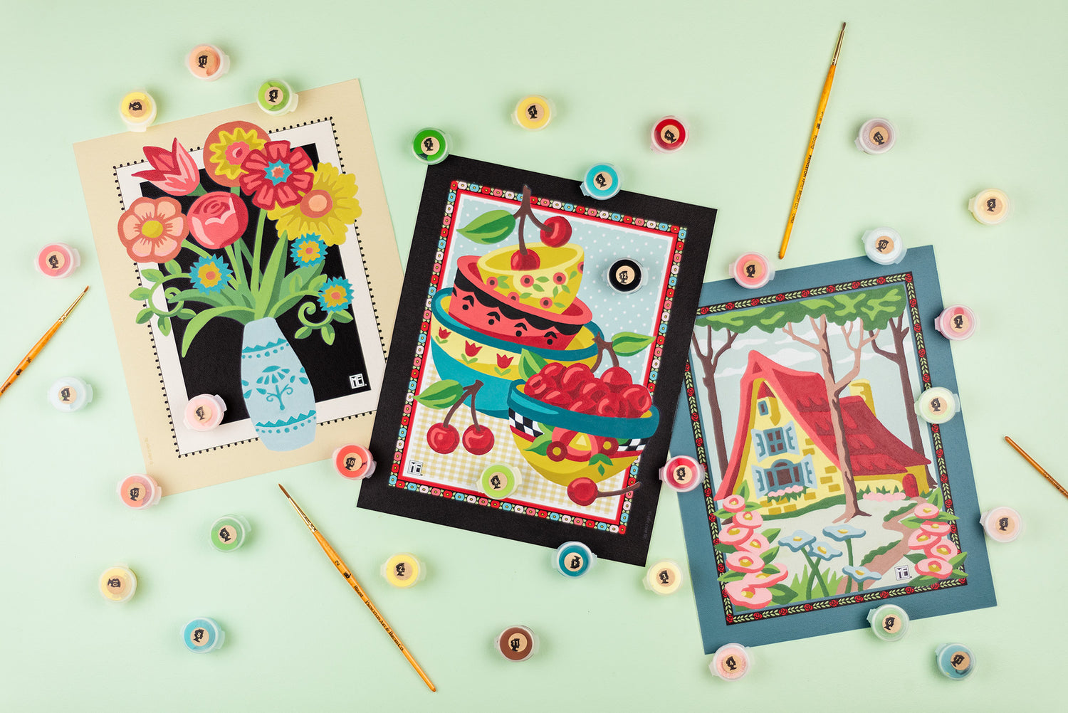 Three Mary Engelbreit paint-by-number kits.