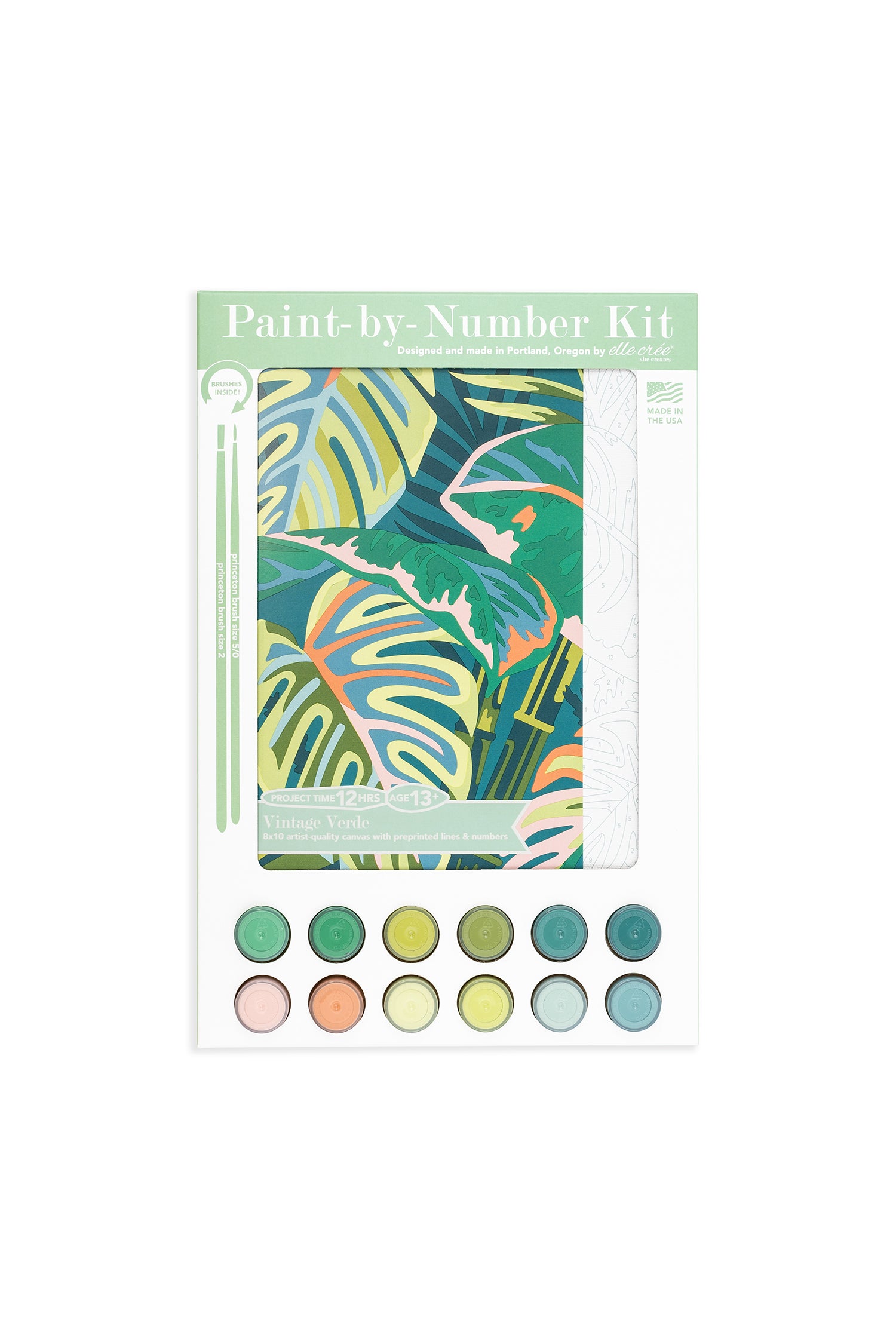 Vintage Verde paint-by-number kit packaging featuring tropical leaf artwork, 12 acrylic paint colors, and brushes, designed by Elle Crée.