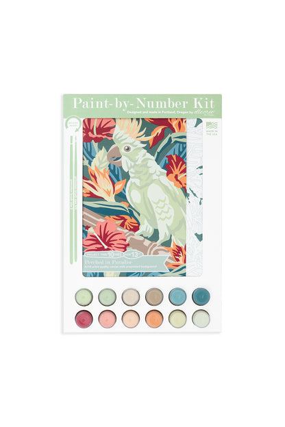 Perched in Paradise 8x10 Paint-by-Number kit from Elle Crée in it's packaging laid against a white background.