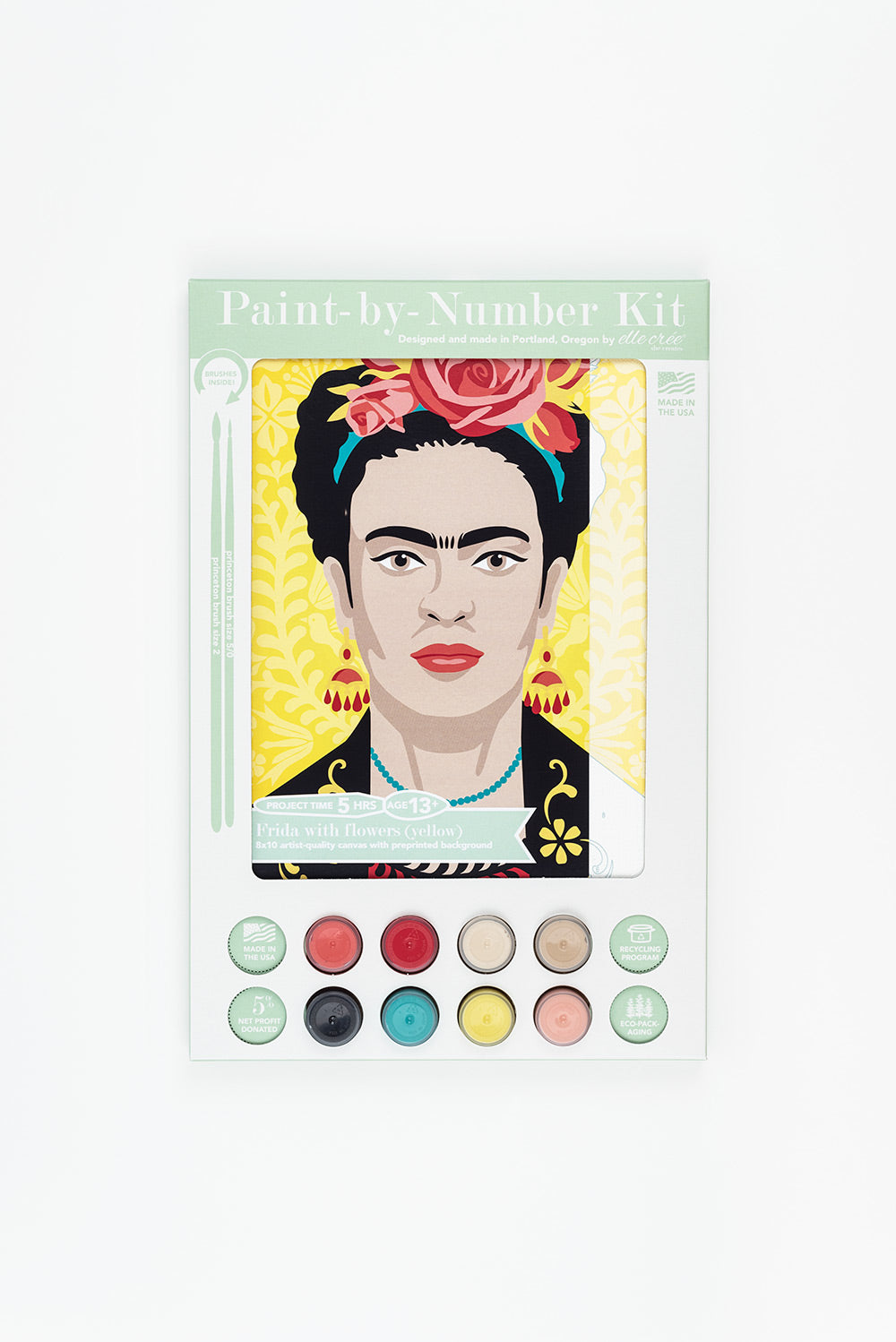 Paint by number kit of a Frida Kahlo portrait in its mint green and white packaging by Elle Crée.