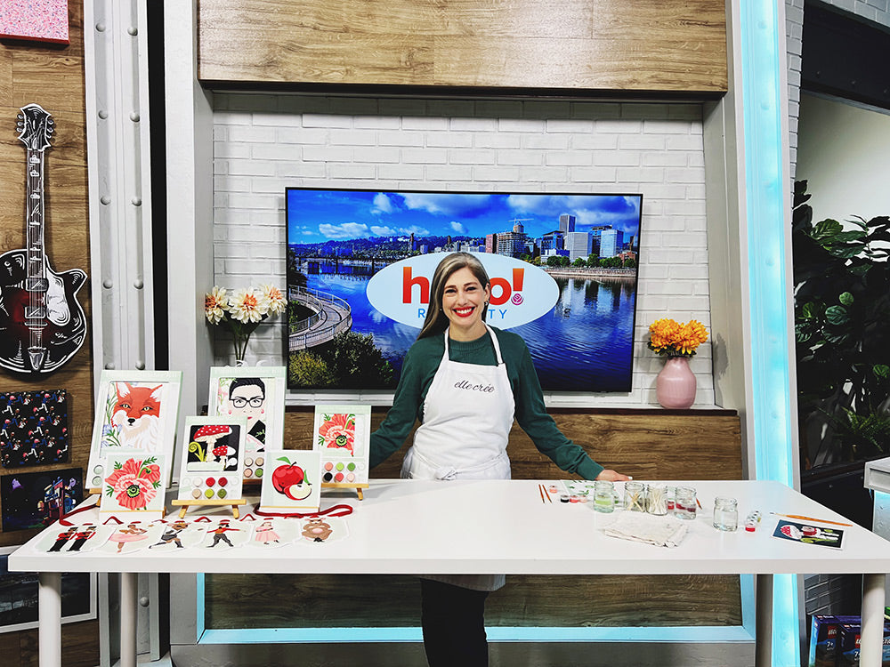Artist and Elle Crée founder, Rachel Austen, on the set of Hello! Rose City with her locally made paint-by-number kits.